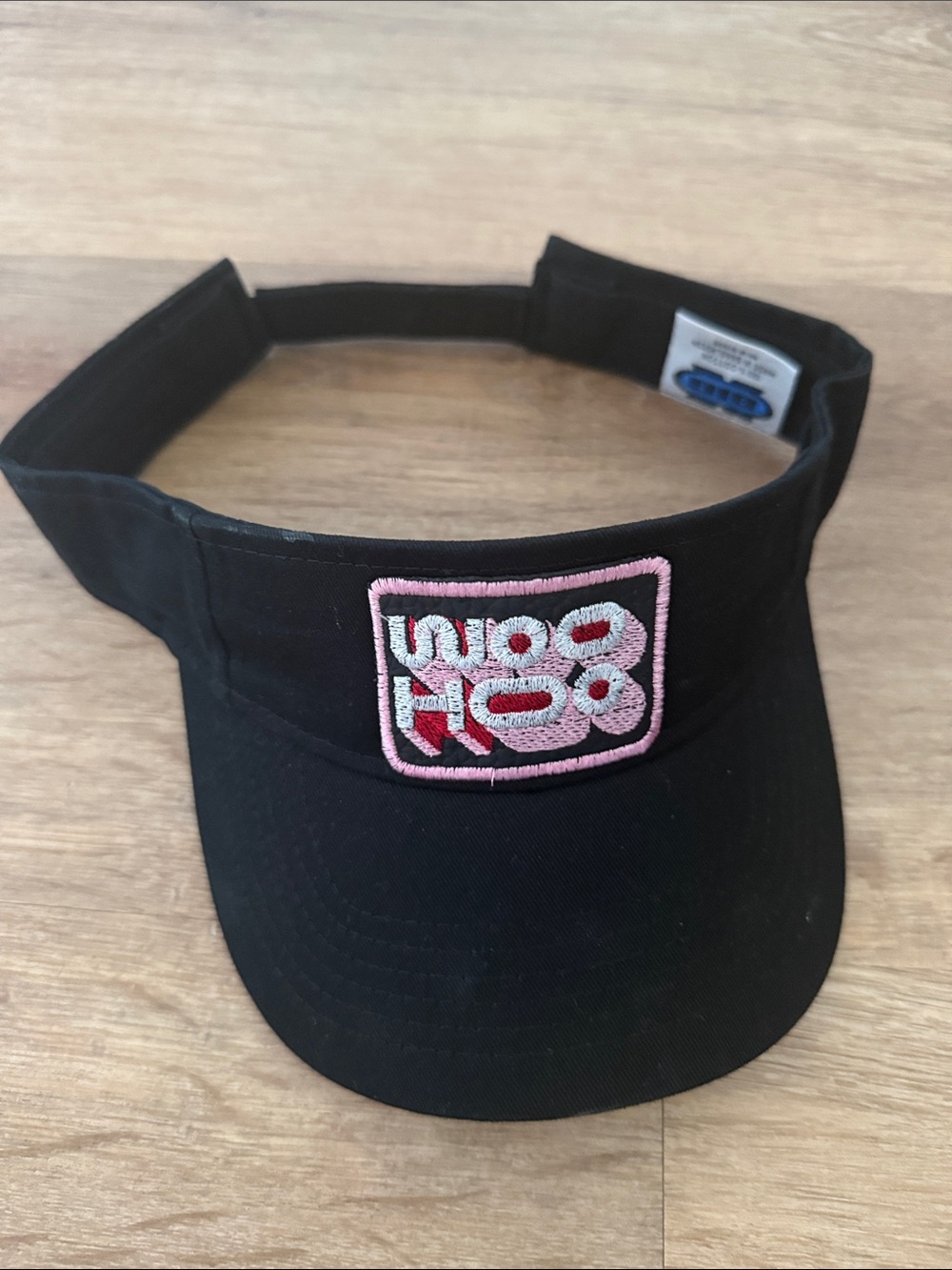 NWOT Black Women's Visor with Pink Embroidered Patch